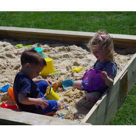 Thumbnail Image of Sandpit with kids playin in it